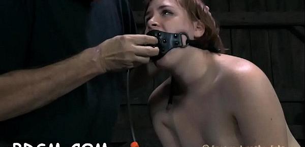  Clamped up hottie gets a hook in her anal with toy torture